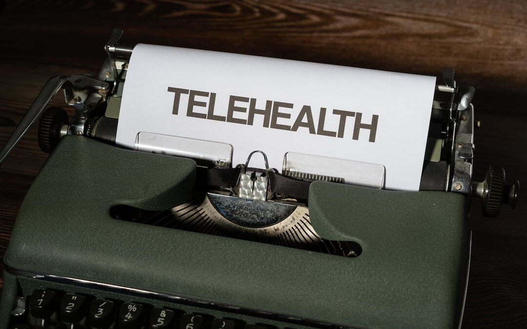 picture of typewriter with Telehealth on paper